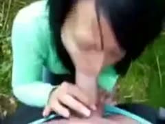Raven haired whore is engulfing and stroking my 10-Pounder in front of a camera 